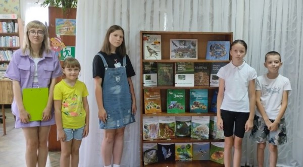 Biblioleto with a book in a summer backpack