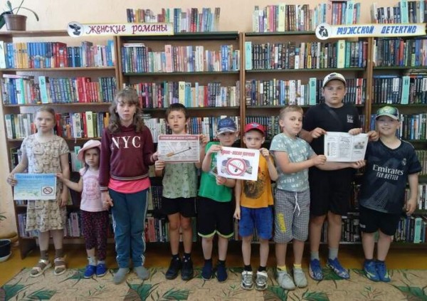 Book and newspaper instead of a cigarette